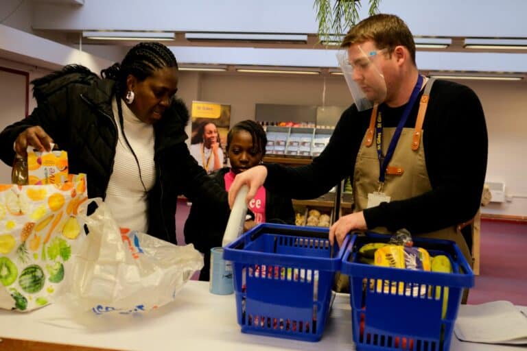 a man and woman in a grocery store