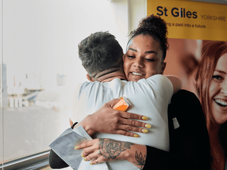 a person hugging a person