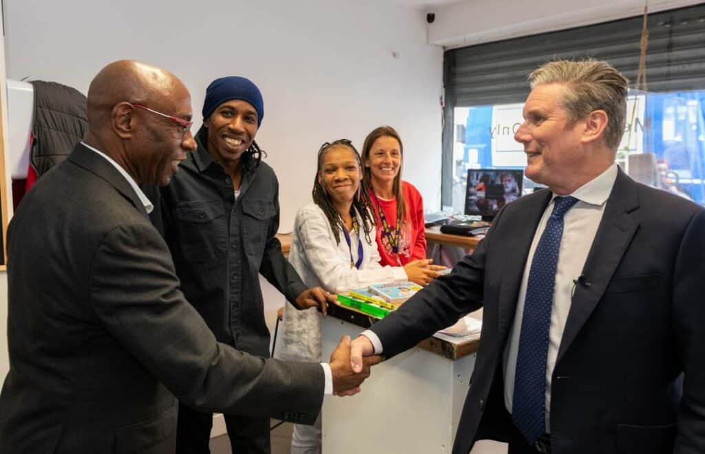 Keir Stamer shaking hands with St Giles staff and project leaders in The Pantry