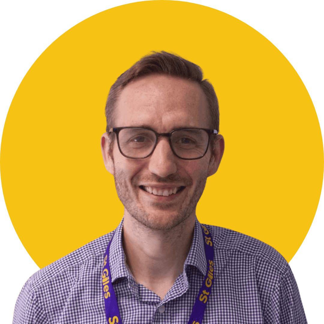 Photograph of Nathan Srokosz with a yellow background.
